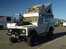 Reisefertiger Land Rover Defender 110 zu verkaufen 